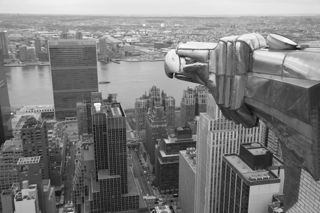 An expanded shot of the blog's banner, a gargoyle of the Chrysler Building overlooking Manhattan